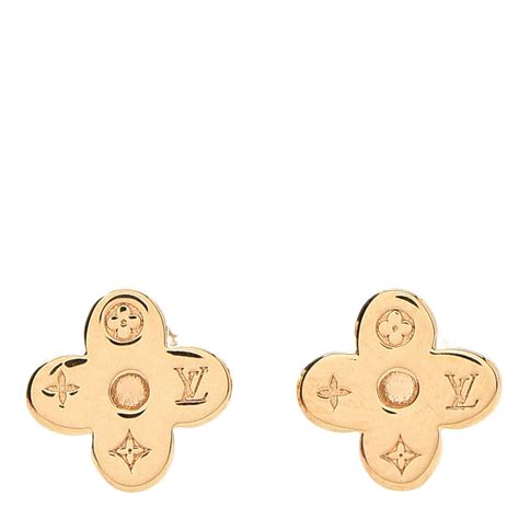 louis vuitton stud earrings.